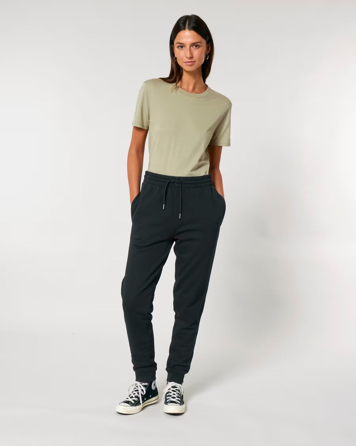 Model wearing plain black joggers to show fit