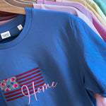 Blue floral flag shirt on a hanger