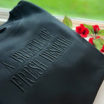 Dark sweatshirt with tonal Breath of Fresh Despair embroidery
