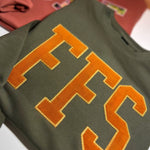 Dark sweatshirt with orange corduroy FFS appliqué
