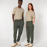 Two models wearing plain olive joggers to show fit