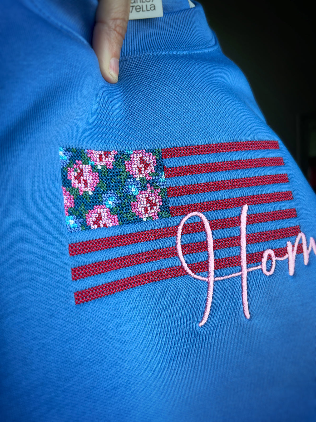 Blue floral American flag embroidery detail