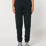 Front view of plain black joggers on a model